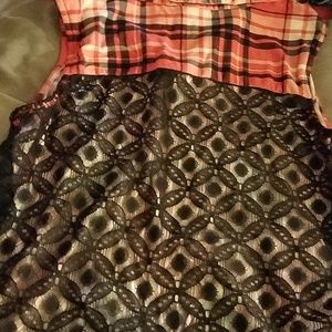 Sleeveless,  lace back, button up